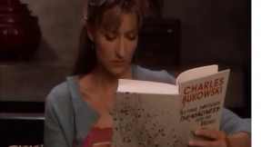 Karen reading Bukowski