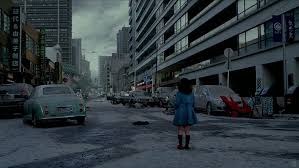 Young Mako Moi stands among a ruined city in Japan after the Kaiju atttack