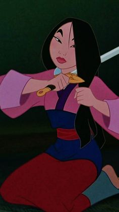 Mulan begins her transition from woman to man by cutting her hair.