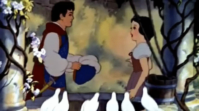 A less-than-happy Snow White reacting to the entrance of her prince.