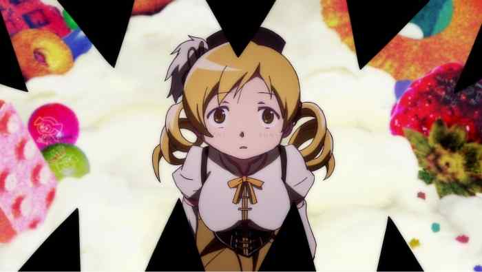 Mami Tomoe stares into the jaws that bring her death in Puella Magi Madoka Magica.