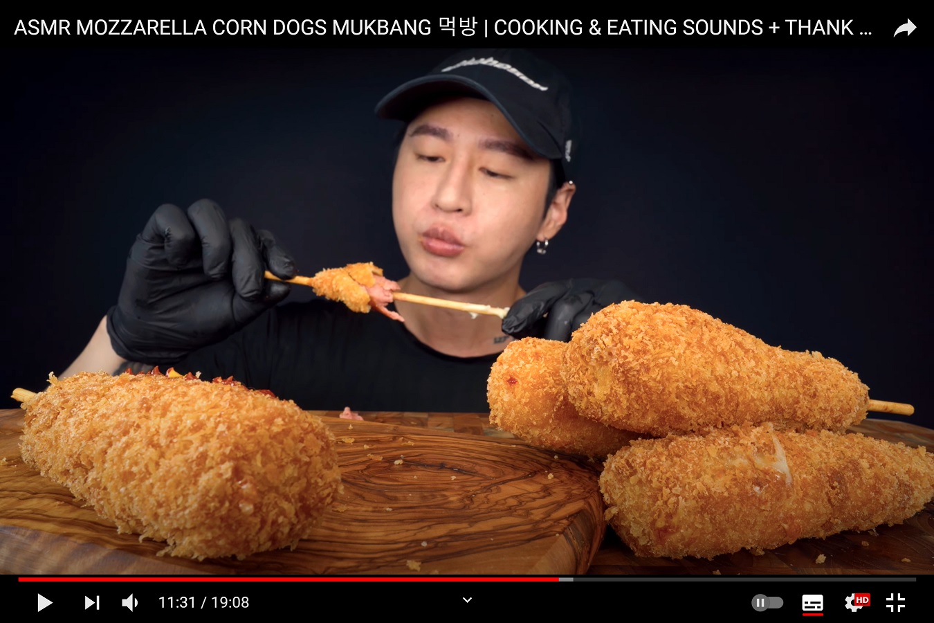 A screenshot of a Mukbang video, showing a typical genre within food videos.