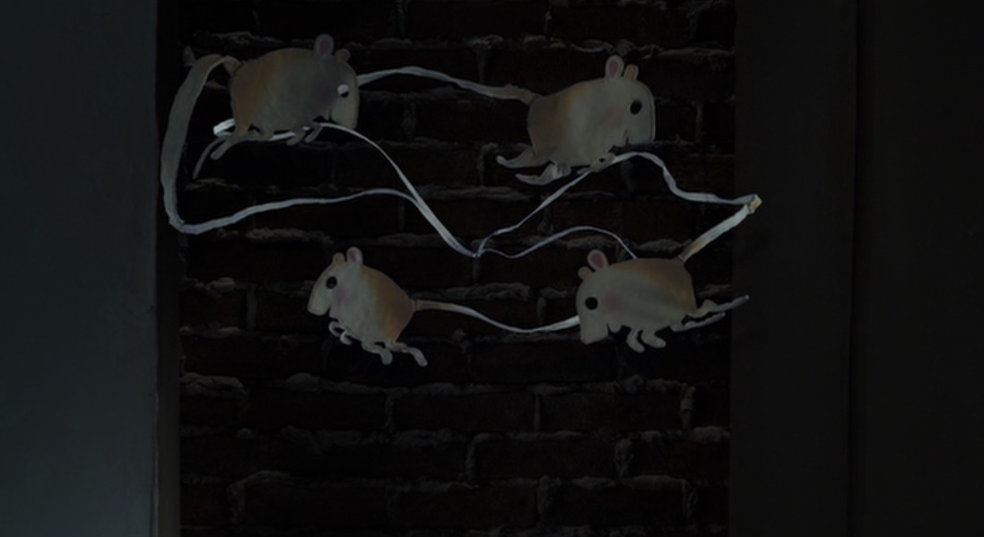 The Other Mother's version of Mr. Bobinsky's mice make their way through the little door