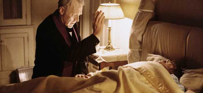 Father Merrin tries to exorcise the demonic Pazuzu from Regan MacNeil in The Exorcist, 1973
