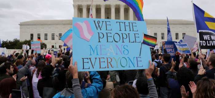 LGBT activists and supporters hold a rally outside the U.S. Supreme Court 