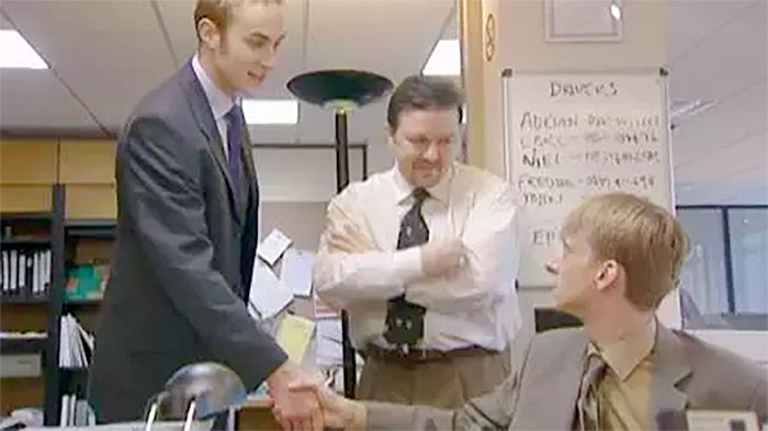 Ricky Howard, the Temporary Worker (far left) introduces himself to David and Gareth