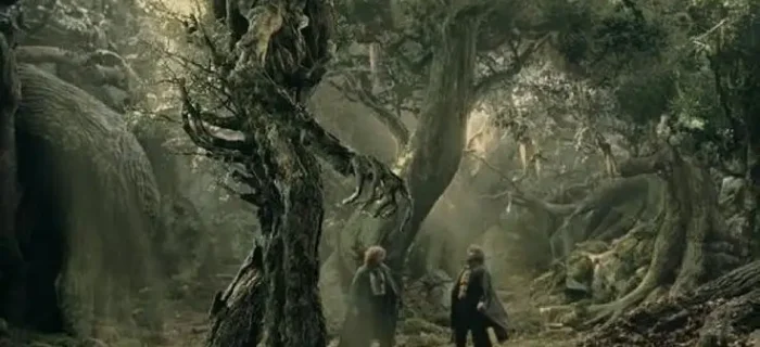 Hobbits talking to one of the forest guardians