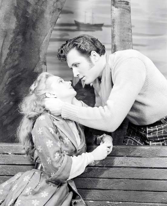 Jan Clayton as Julie Jordan and John Raitt as Billy Bigelow in Carousel